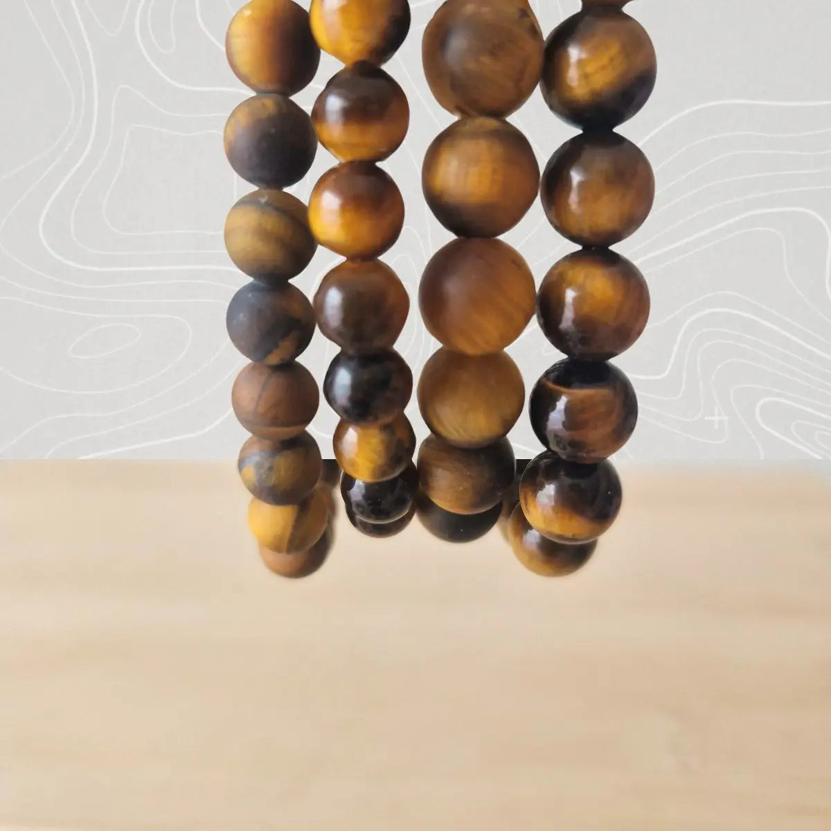 bracelet oeil tigre 6 et  8mm  poli ou mat 