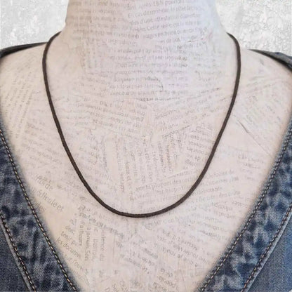 Cordon coton ciré 2 mm en noir, fintion acier inoxydable